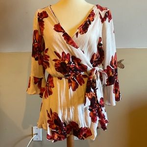 Free People right ruffles romper